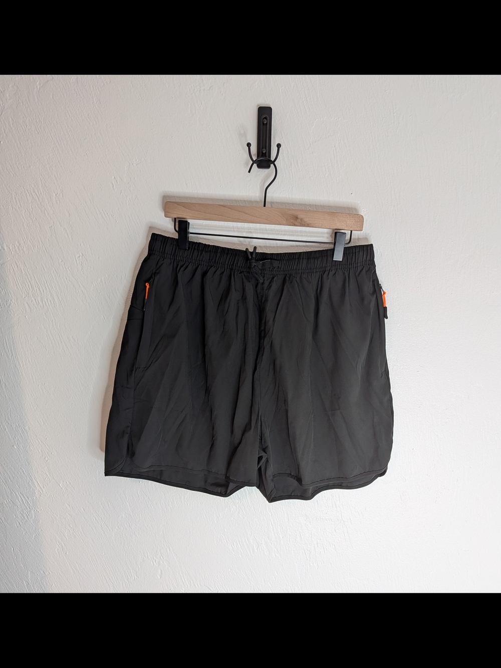 Women's Black Athletic Shorts with Orange Zip Accents